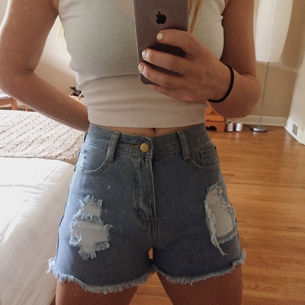 Light wash high waisted distressed denim shorts